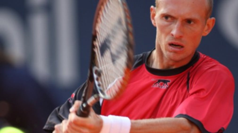 Nikolay Davydenko's hopes of a Masters Cup place took a knock when he lost in the second round in Madrid on Wednesday.