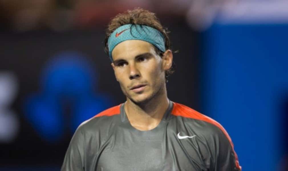 Rafael Nadal admits he has not fully recovered from a back injury but has no regrets about playing at the Rio Open