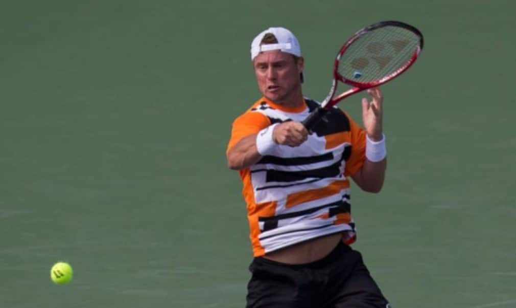 Lleyton Hewitt claimed his 600th match win at the Sony Open as he set up a second-round clash with Rafael Nadal in Miami