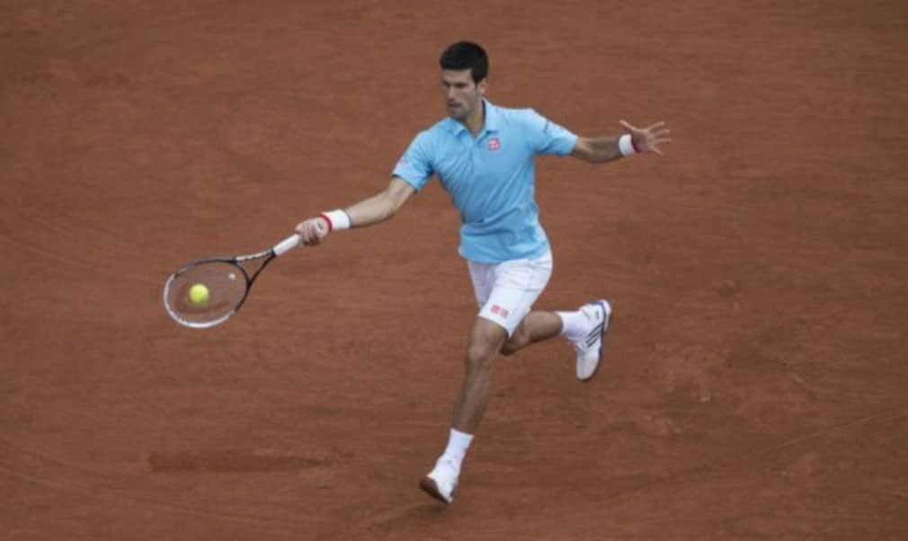 Novak Djokovic swept past French hope Jo-Wilfried Tsonga 6-1 6-4 6-1 in just 89 minutes to reach his 20th straight Grand Slam quarter-final