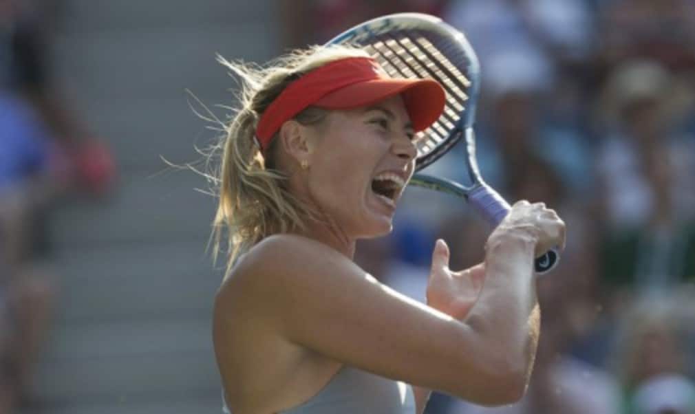 Caroline Wozniacki produced one of the performances of her career to reach the quarter-finals for the first time since 2011 as Roger Federer regrouped after the rain to rout Marcel Granollers