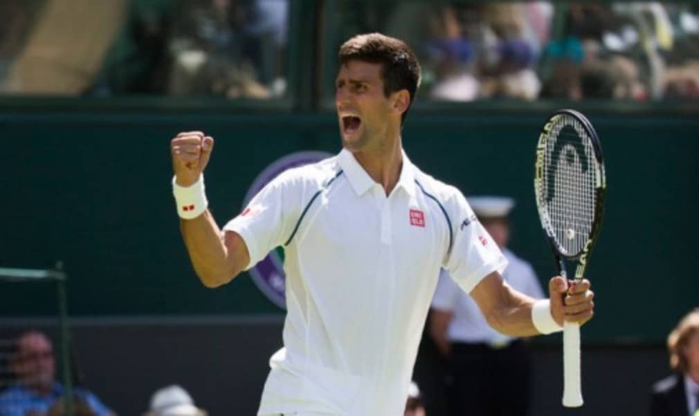World No.1 Novak Djokovic overcame a two-set deficit and an overnight delay to keep his Wimbledon title defence on track