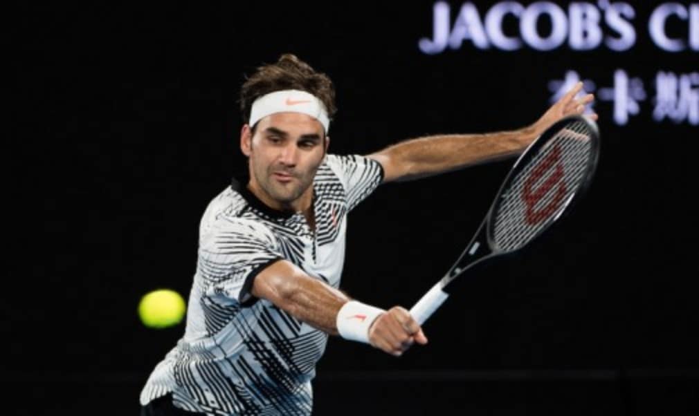 Former Australian Open champion Roger Federer rolled back the years with a sublime victory over Tomas Berdych