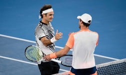 Roger Federer avoided an upset at the hands of Mischa Zverev to set an all-Swiss semi-final with Stan Wawrinka at the Australian Open