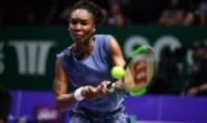 Venus Williams showed tremendous fighting spirit as she defeated Garbine Muguruza 7-5 6-4 to take her place in the semi-finals of the BNP Paribas WTA Finals in Singapore