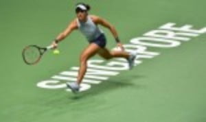 Caroline Garcia has emerged as the surprise winner of the Red Group at the BNP Paribas WTA Finals in Singapore