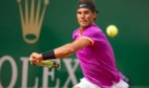 Rafael Nadal eased into a 12th final at the Rolex Monte-Carlo Masters with a 6-4 6-1 success over Grigor Dimitrov