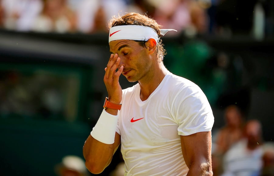 Rafa Nadal looks disappointed Wimbledon