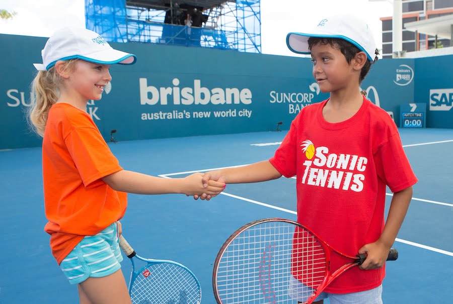 Children playing tennis