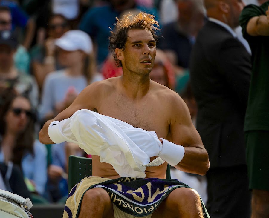 Topless Rafa Nadal changes shirt at Wimbledon