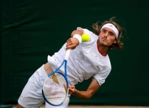 Stefanos Tsitsipas serving at Wimbledon