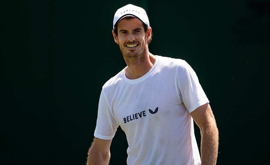 Andy Murray smiling in practice