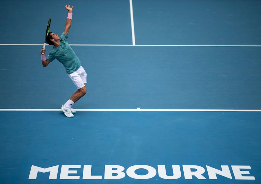 Jaume Munar serves at Australian Open 2019