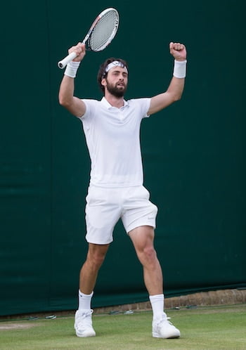 Nikoloz Basilashvili celebrates at Wimbledon