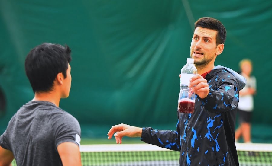 Novak Djokovic chats at Mouratgolou Academy