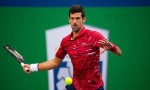 Novak Djokovic focusses on a forehand at Shanghai 2019
