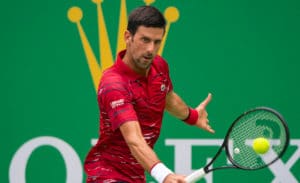 Novak Djokovic plays a backhand at the Shanghai Masters 2019