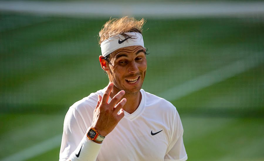 Rafa Nadal smiles at Wimbledon 2019