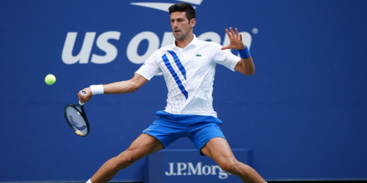 Novak Djokovic sliding