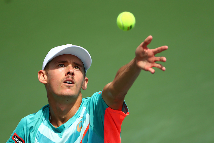 Alex de Minaur in action against Richard Gasquet during a men's singles match at the 2020 US Open