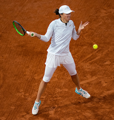 Iga Swiatek drives a forehand on her way to the title at Roland Garros 2020