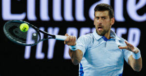 Novak Djokovic hits tennis ball Australian Open 2024
